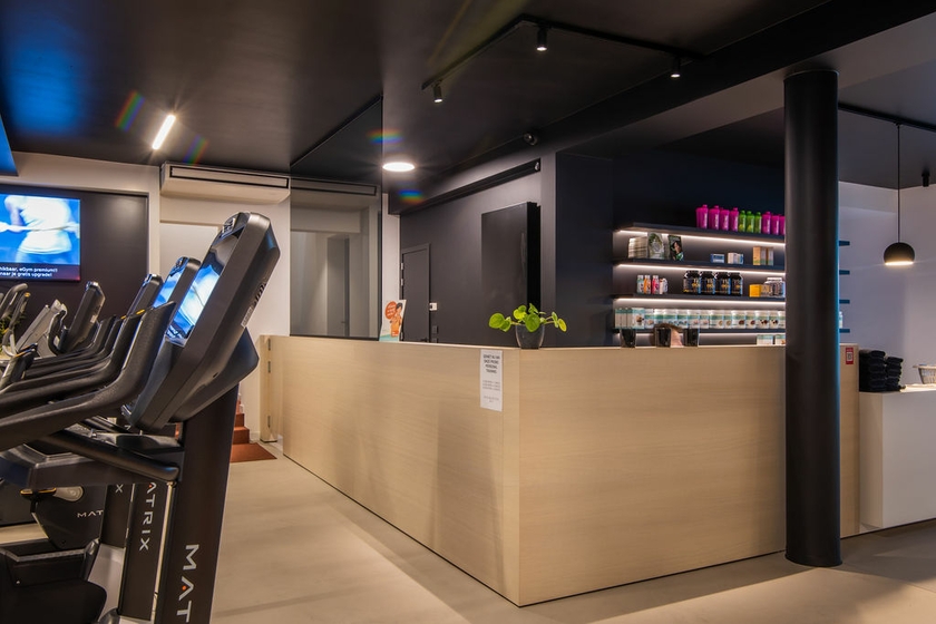 schilderen fitnessruimte door Lafaut Schilderwerken 