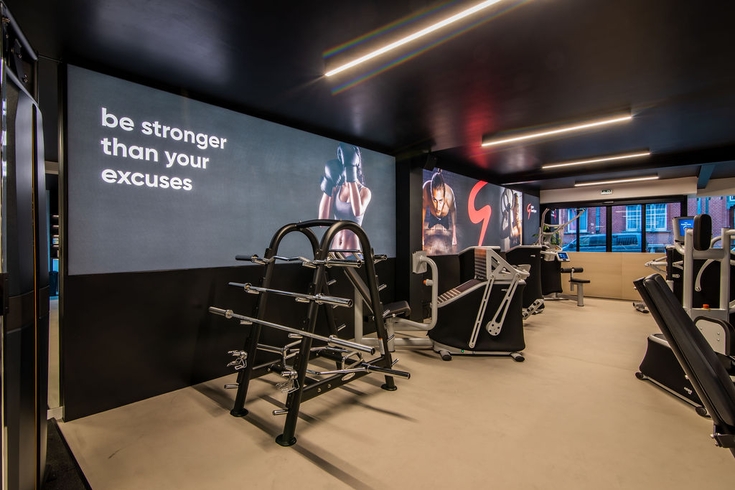 binnen schilderwerken fitnessruimte door Lafaut 